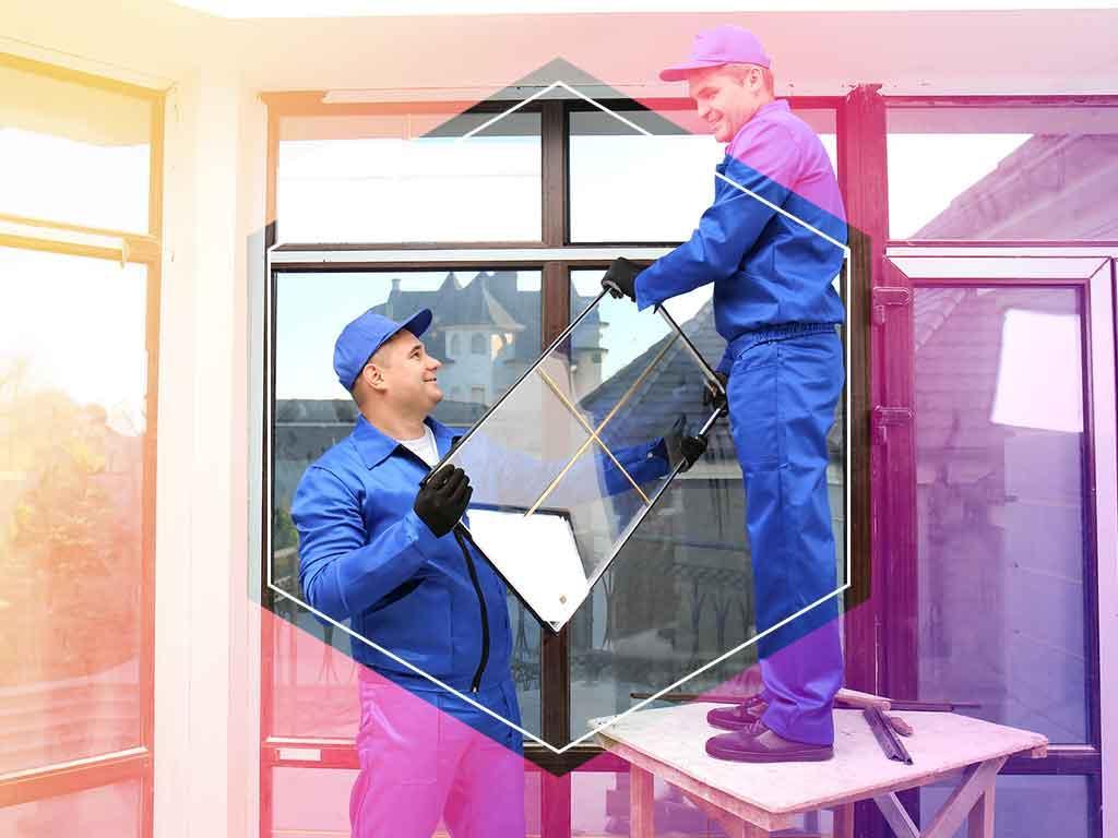 two technicians installing new window