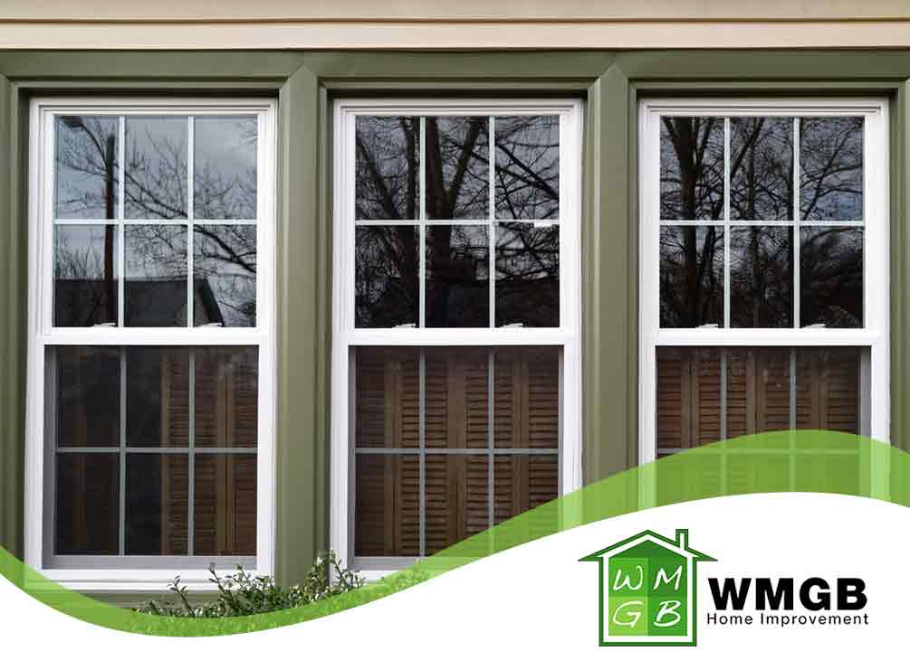 triple panel window exterior of house green trim wmgb