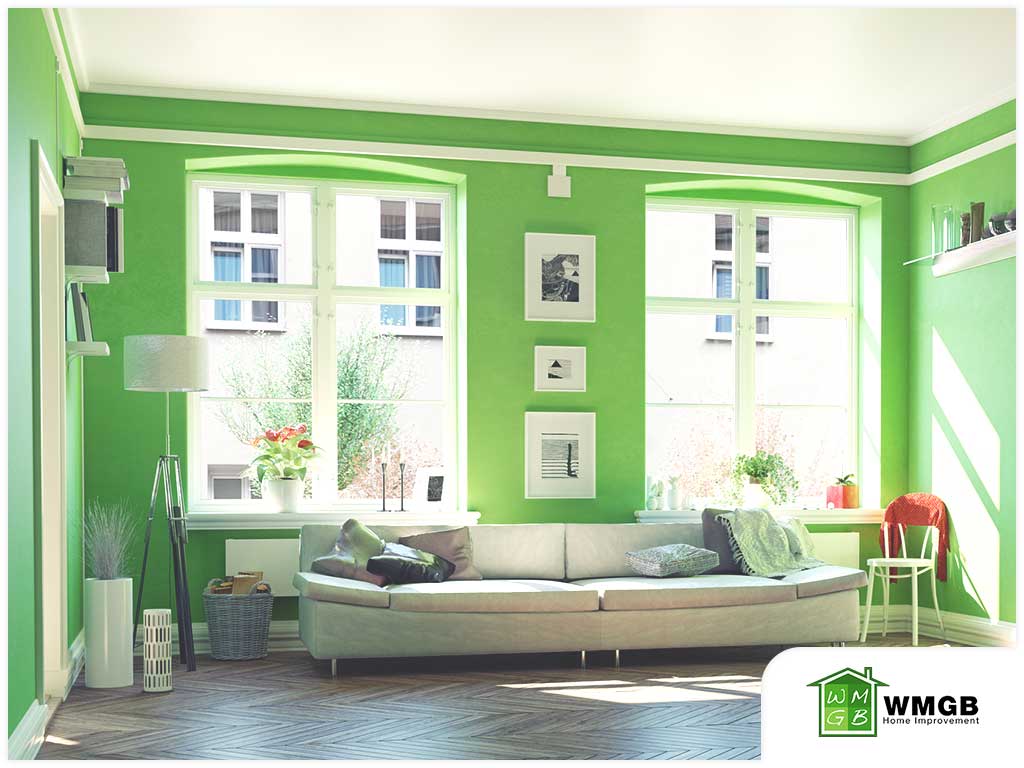 bright green apartment living room ceiling high arched windows