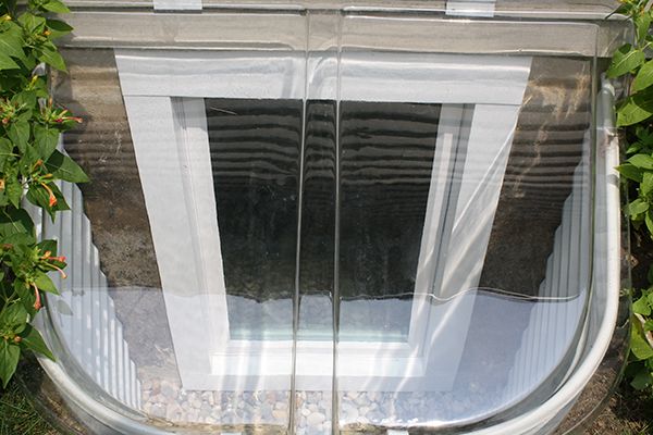 Casement Egress Window in Boman-Kemp Window Well With Dome Cover