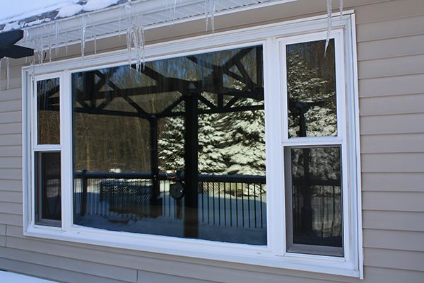 New Triple Pan Picture Window With Double-Hung Windows On Each Side