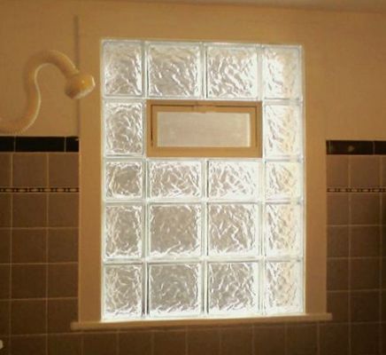 interior of glass block installation with marble in bathroom